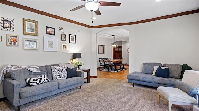 129 Grey Friar Ln, Eau Claire, WI 54701 - carpeted living area with arched walkways, ceiling fan, ornamental molding, baseboards, and recessed lighting