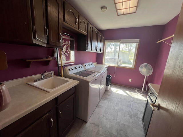 432 S Union St, Mauston, WI 53948 - clothes washing area featuring independent washer and dryer and a sink