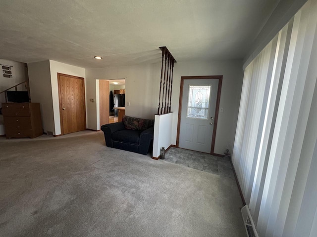 432 S Union St, Mauston, WI 53948 - carpeted entrance foyer with baseboards and recessed lighting