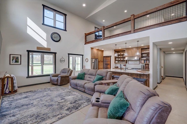 2515 County Road Hk, Barneveld, WI 53507 - living room with a high ceiling, healthy amount of natural light, baseboards, recessed lighting, and french doors