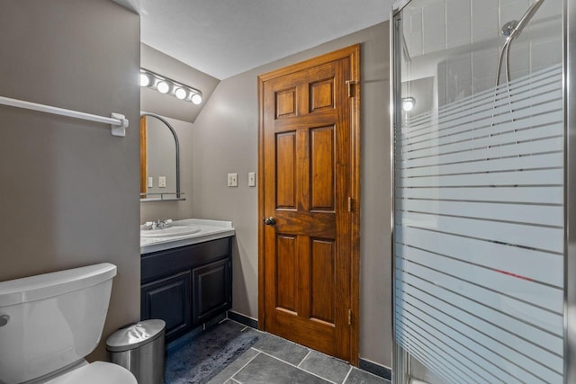 W343S9320 Jericho Dr, Eagle, WI 53119 - bathroom with a stall shower, vanity, toilet, tile patterned flooring, and baseboards