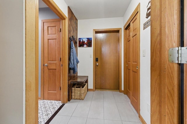 628 Sedge Meadow Ct, Summit, WI 53066 - hallway featuring light tile patterned floors