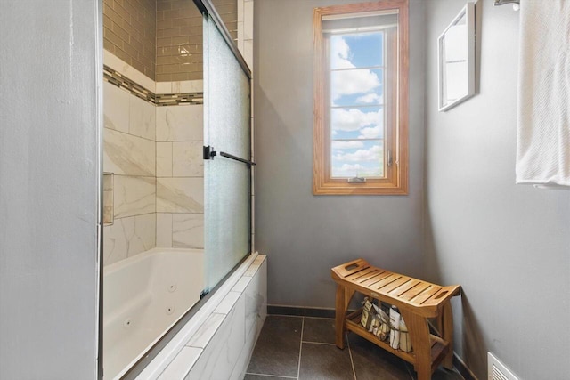 628 Sedge Meadow Ct, Summit, WI 53066 - bathroom with tile patterned flooring, a combined bath / shower with jetted tub, and baseboards