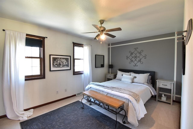 3001 Revere Rd, Plover, WI 54406 - bedroom featuring carpet floors, baseboards, and a ceiling fan