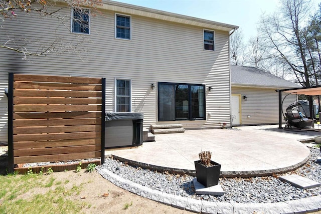 3001 Revere Rd, Plover, WI 54406 - back of house with a patio area