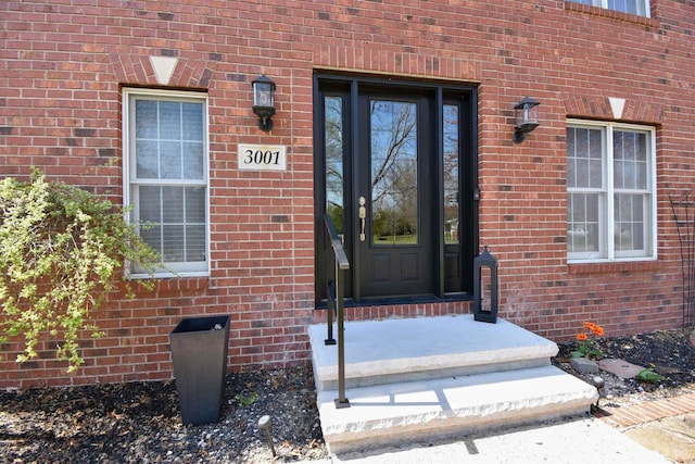 3001 Revere Rd, Plover, WI 54406 - view of exterior entry featuring brick siding