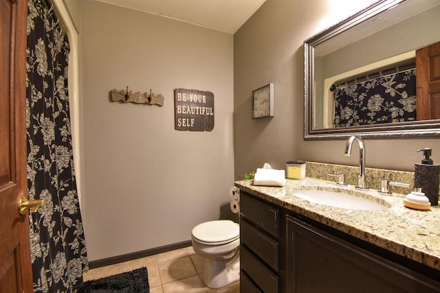 3001 Revere Rd, Plover, WI 54406 - bathroom featuring tile patterned floors, toilet, vanity, and baseboards