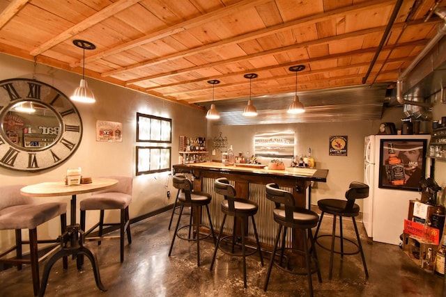 3001 Revere Rd, Plover, WI 54406 - indoor bar featuring concrete flooring, wood ceiling, freestanding refrigerator, beam ceiling, and pendant lighting