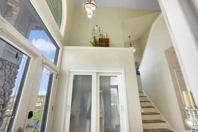 N53W16789 Prairie Dawn, Menomonee Falls, WI 53051 - entrance foyer featuring stairway and a high ceiling