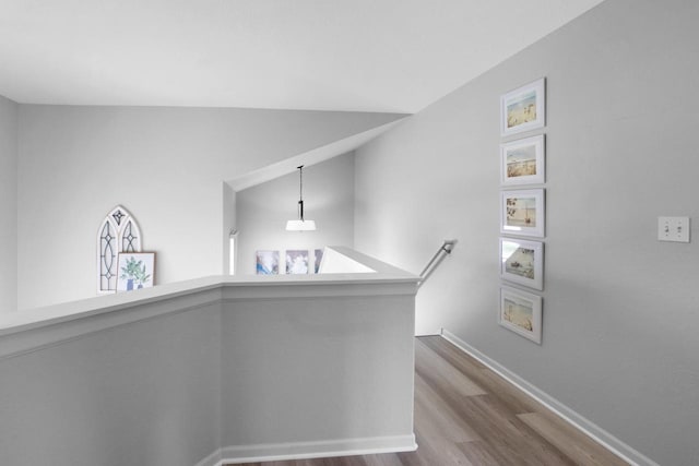 N53W16789 Prairie Dawn, Menomonee Falls, WI 53051 - corridor featuring dark wood-type flooring, an upstairs landing, and baseboards