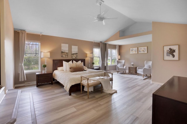 N53W16789 Prairie Dawn, Menomonee Falls, WI 53051 - bedroom featuring light wood finished floors, baseboards, high vaulted ceiling, and a ceiling fan