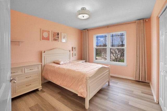 N53W16789 Prairie Dawn, Menomonee Falls, WI 53051 - bedroom with light wood finished floors and baseboards