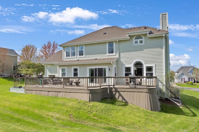 N53W16789 Prairie Dawn, Menomonee Falls, WI 53051 - back of property with a yard, a chimney, and a wooden deck