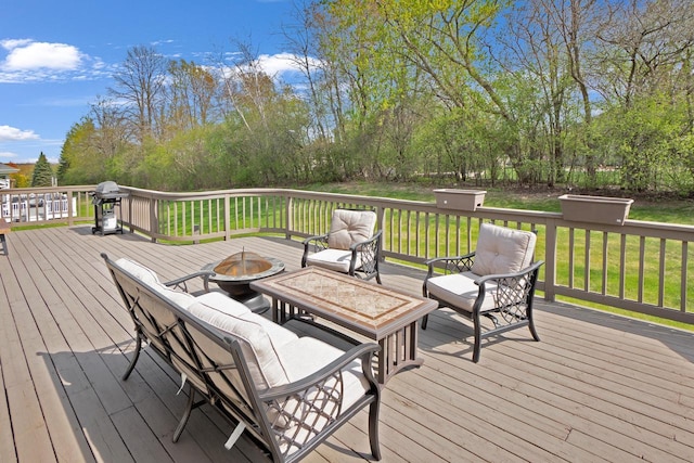 N53W16789 Prairie Dawn, Menomonee Falls, WI 53051 - wooden terrace with a fire pit, a lawn, and a grill
