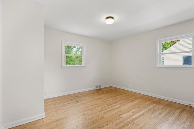 4516 Maher Ave, Madison, WI 53716 - unfurnished room featuring baseboards and light wood-style floors