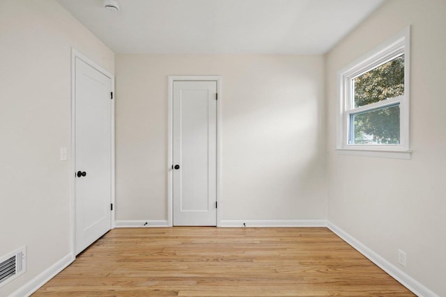 4516 Maher Ave, Madison, WI 53716 - unfurnished bedroom with light wood-style flooring and baseboards