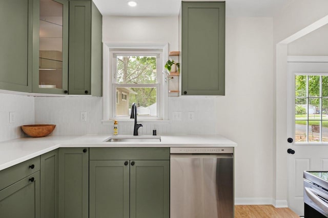 4516 Maher Ave, Madison, WI 53716 - kitchen featuring green cabinetry, stainless steel dishwasher, and a sink