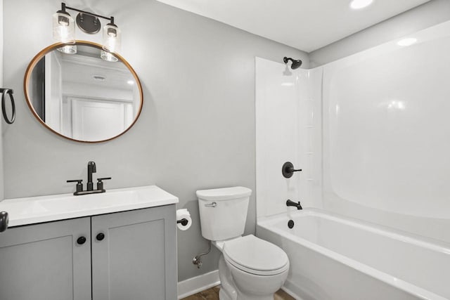 4516 Maher Ave, Madison, WI 53716 - full bathroom with vanity, toilet, bathtub / shower combination, and baseboards