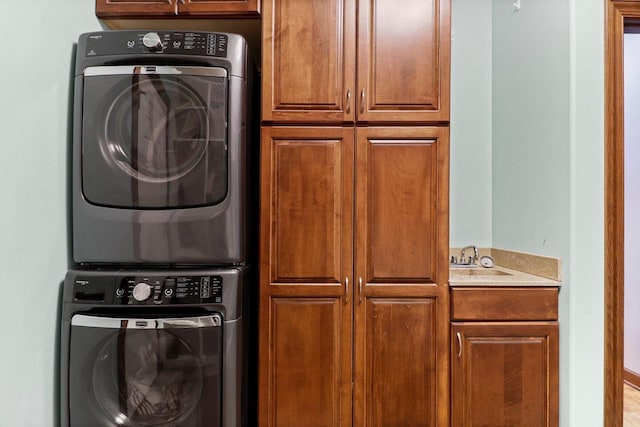 805 Mourning Dove Dr, Cottage Grove, WI 53527 - washroom with cabinet space and stacked washer / dryer