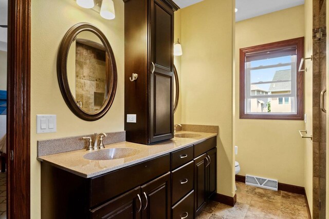805 Mourning Dove Dr, Cottage Grove, WI 53527 - bathroom featuring double vanity and toilet