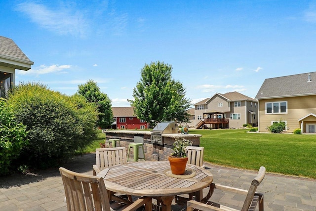 805 Mourning Dove Dr, Cottage Grove, WI 53527 - view of patio / terrace featuring exterior kitchen, a residential view, and outdoor dining area