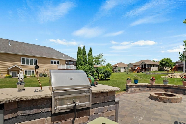 805 Mourning Dove Dr, Cottage Grove, WI 53527 - view of patio with a fire pit, a grill, and a residential view