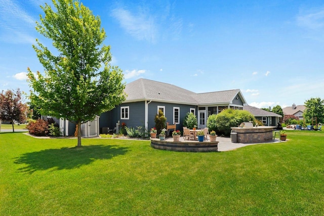 805 Mourning Dove Dr, Cottage Grove, WI 53527 - rear view of house featuring a patio, a lawn, and roof with shingles
