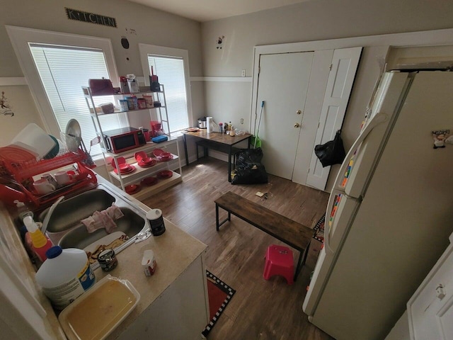 living room with wood finished floors