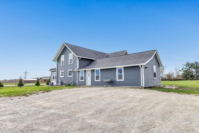 3265 County Road C, Oconto Falls, WI 54154 - view of front facade featuring roof with shingles and central AC