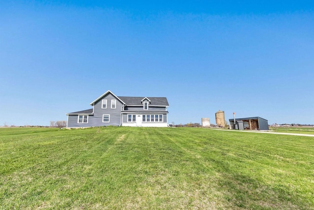 3265 County Road C, Oconto Falls, WI 54154 - back of house featuring a lawn