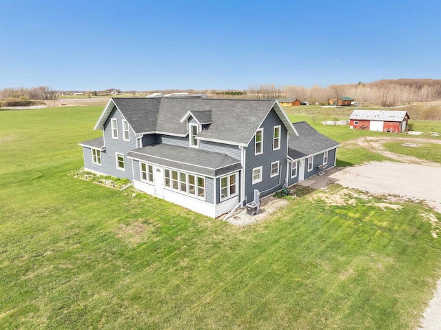 3265 County Road C, Oconto Falls, WI 54154 - back of property with roof with shingles, driveway, and a yard