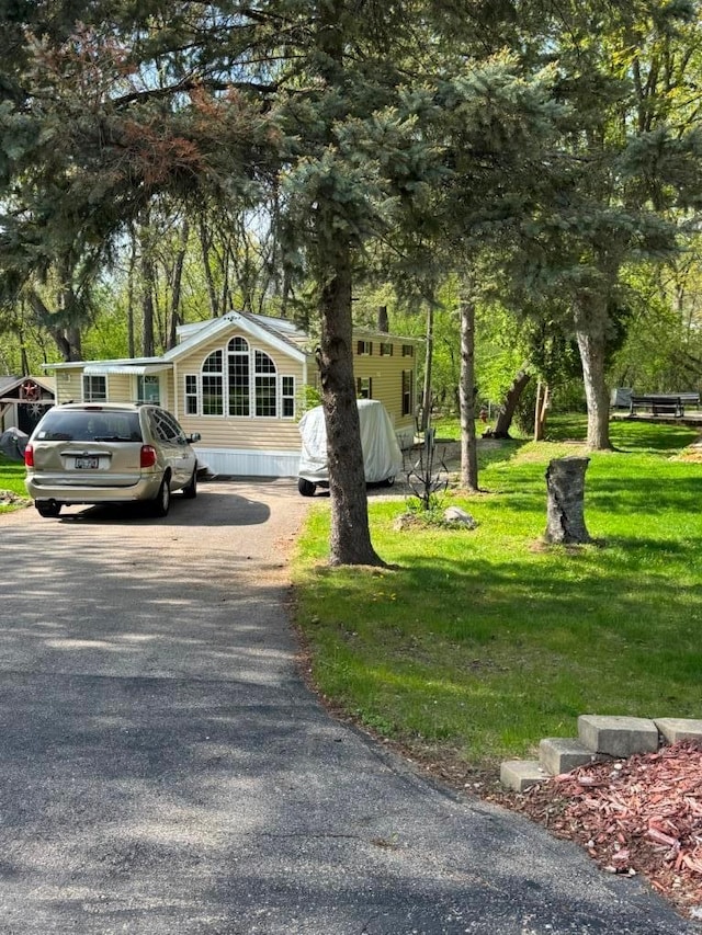 463 Aspen Way, Edgerton, WI 53534 - view of front of house with driveway and a front lawn