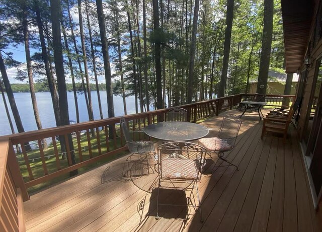 N11894 E Deer Lake Rd, Tomahawk, WI 54487 - deck with a water view and outdoor dining space