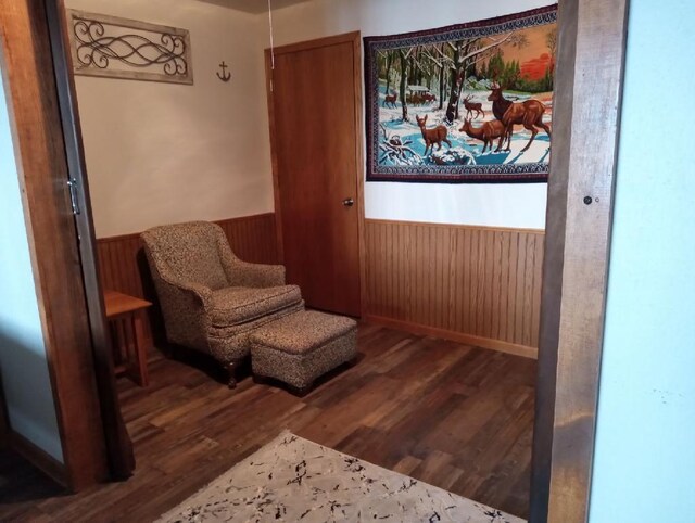 N11894 E Deer Lake Rd, Tomahawk, WI 54487 - living area with wainscoting, wood finished floors, and wooden walls