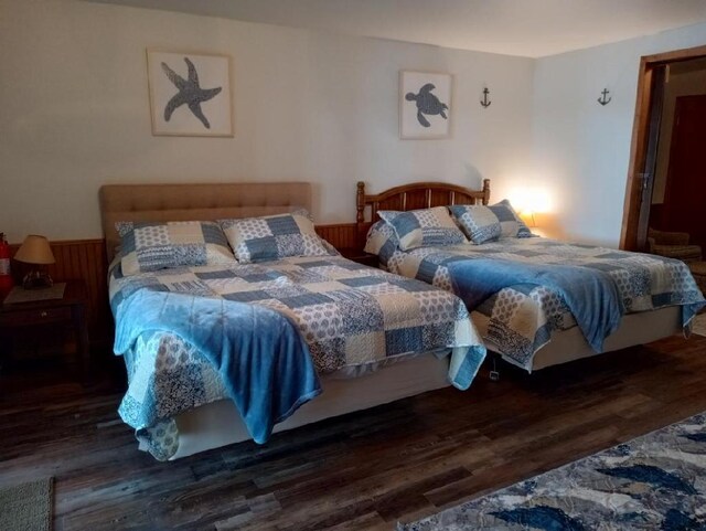 N11894 E Deer Lake Rd, Tomahawk, WI 54487 - bedroom featuring wood finished floors