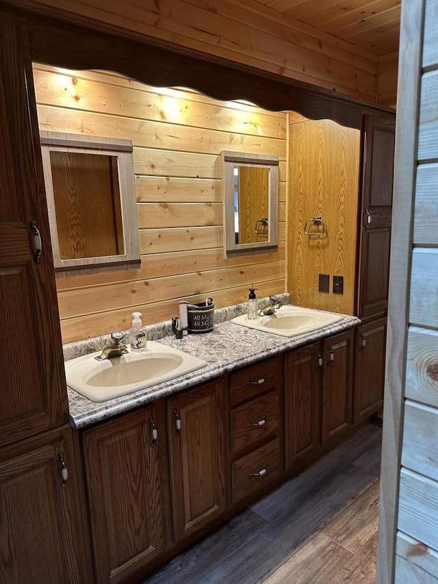 N11894 E Deer Lake Rd, Tomahawk, WI 54487 - bathroom with wood finished floors, double vanity, wooden walls, and wood ceiling