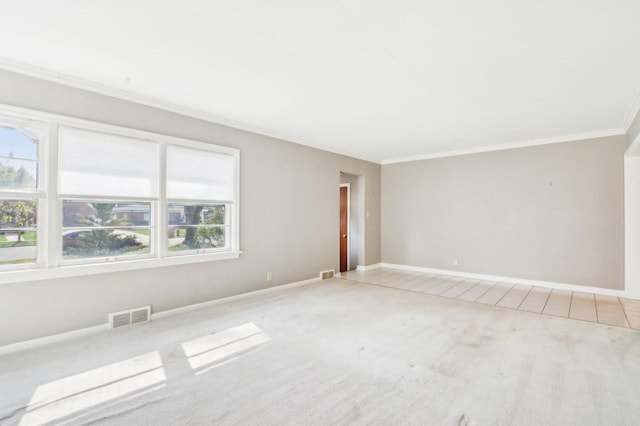 7700 3rd Ave, Kenosha, WI 53143 - unfurnished room featuring ornamental molding, baseboards, and carpet