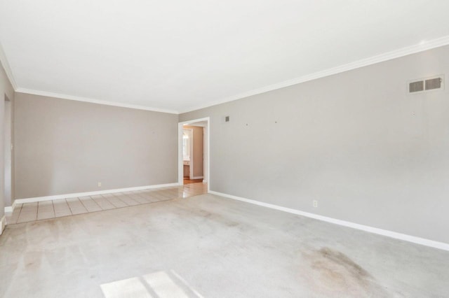 7700 3rd Ave, Kenosha, WI 53143 - carpeted spare room with ornamental molding and baseboards