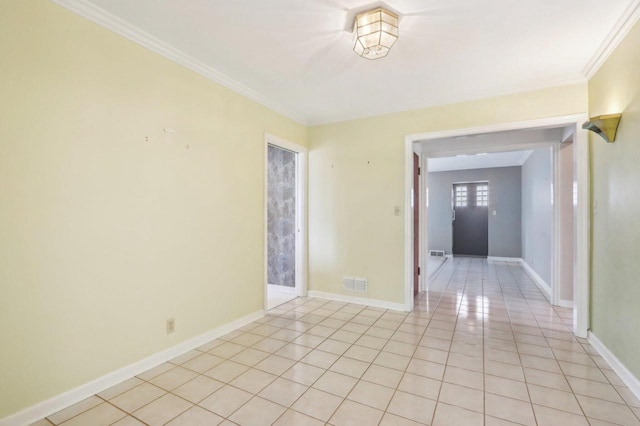 7700 3rd Ave, Kenosha, WI 53143 - unfurnished room featuring crown molding, baseboards, and light tile patterned floors