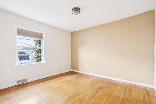 7700 3rd Ave, Kenosha, WI 53143 - unfurnished room featuring light wood-style floors and baseboards