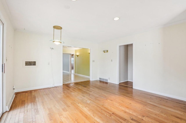 7700 3rd Ave, Kenosha, WI 53143 - unfurnished room with light wood-style flooring and baseboards