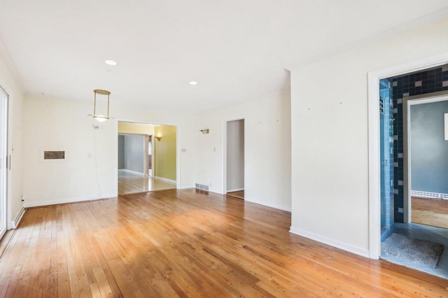 7700 3rd Ave, Kenosha, WI 53143 - spare room with light wood-style floors, baseboards, and recessed lighting