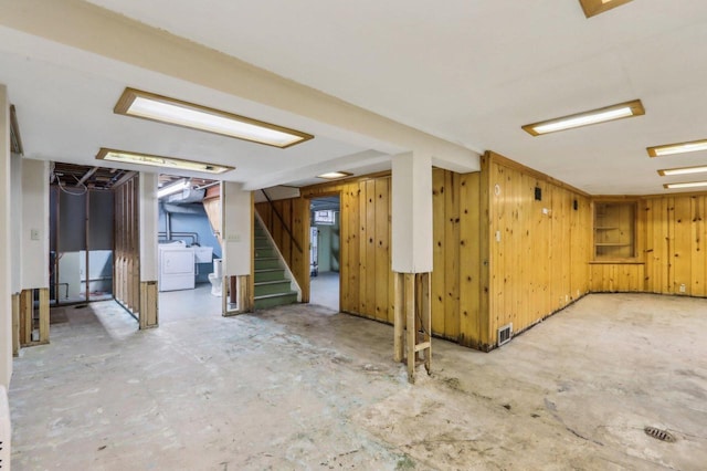 7700 3rd Ave, Kenosha, WI 53143 - finished below grade area with washer / dryer, stairway, and wooden walls