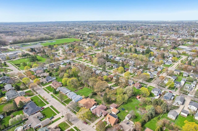 7700 3rd Ave, Kenosha, WI 53143 - aerial view of property and surrounding area with nearby suburban area