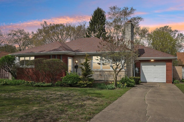 7700 3rd Ave, Kenosha, WI 53143 - single story home featuring driveway, a yard, a garage, a chimney, and stone siding