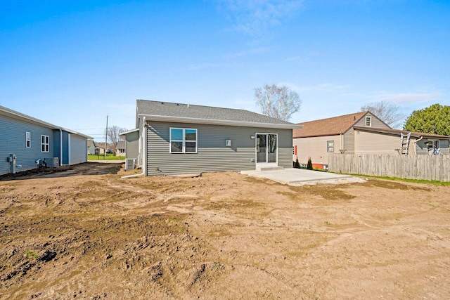 4551 Menasha Ave, Manitowoc, WI 54220 - back of property with a patio and fence