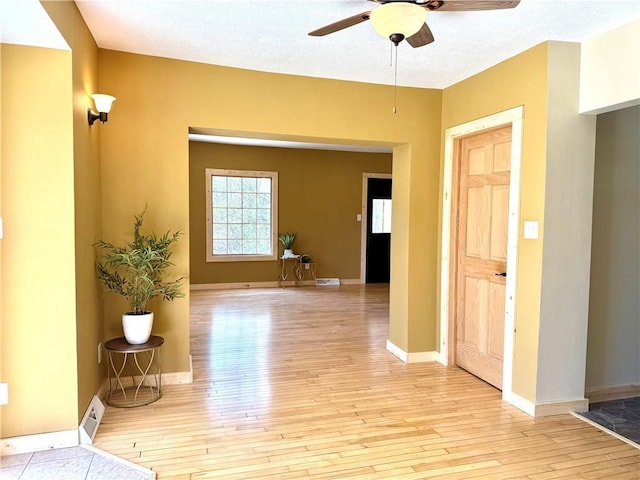 208 N 7th St, Cameron, WI 54822 - hall featuring light wood-type flooring and baseboards