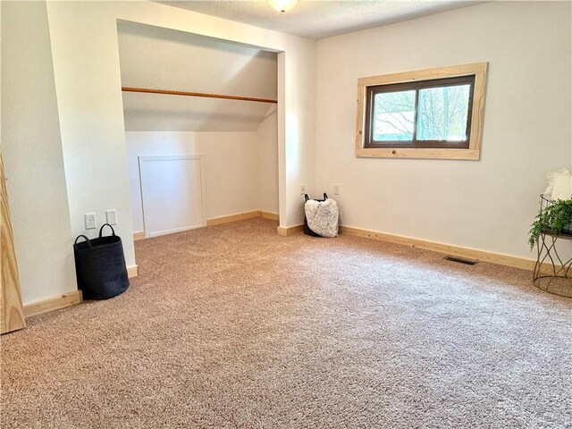 208 N 7th St, Cameron, WI 54822 - unfurnished bedroom featuring carpet, baseboards, and a closet