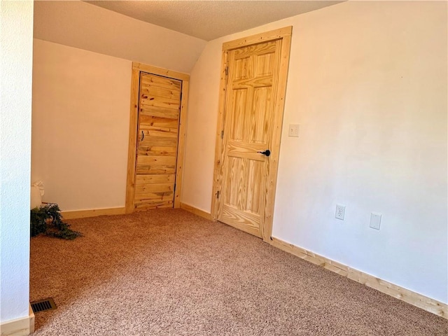 208 N 7th St, Cameron, WI 54822 - carpeted spare room with lofted ceiling and baseboards