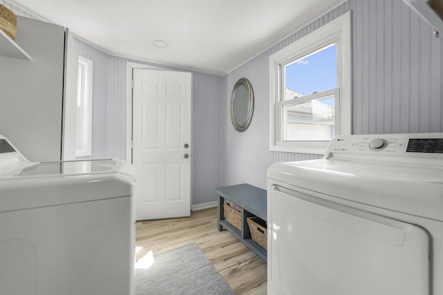 1301 Jackson St, Stoughton, WI 53589 - washroom with washing machine and dryer and light wood-style floors